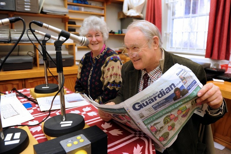 Image showing newspaper being read at Talking Newspapers