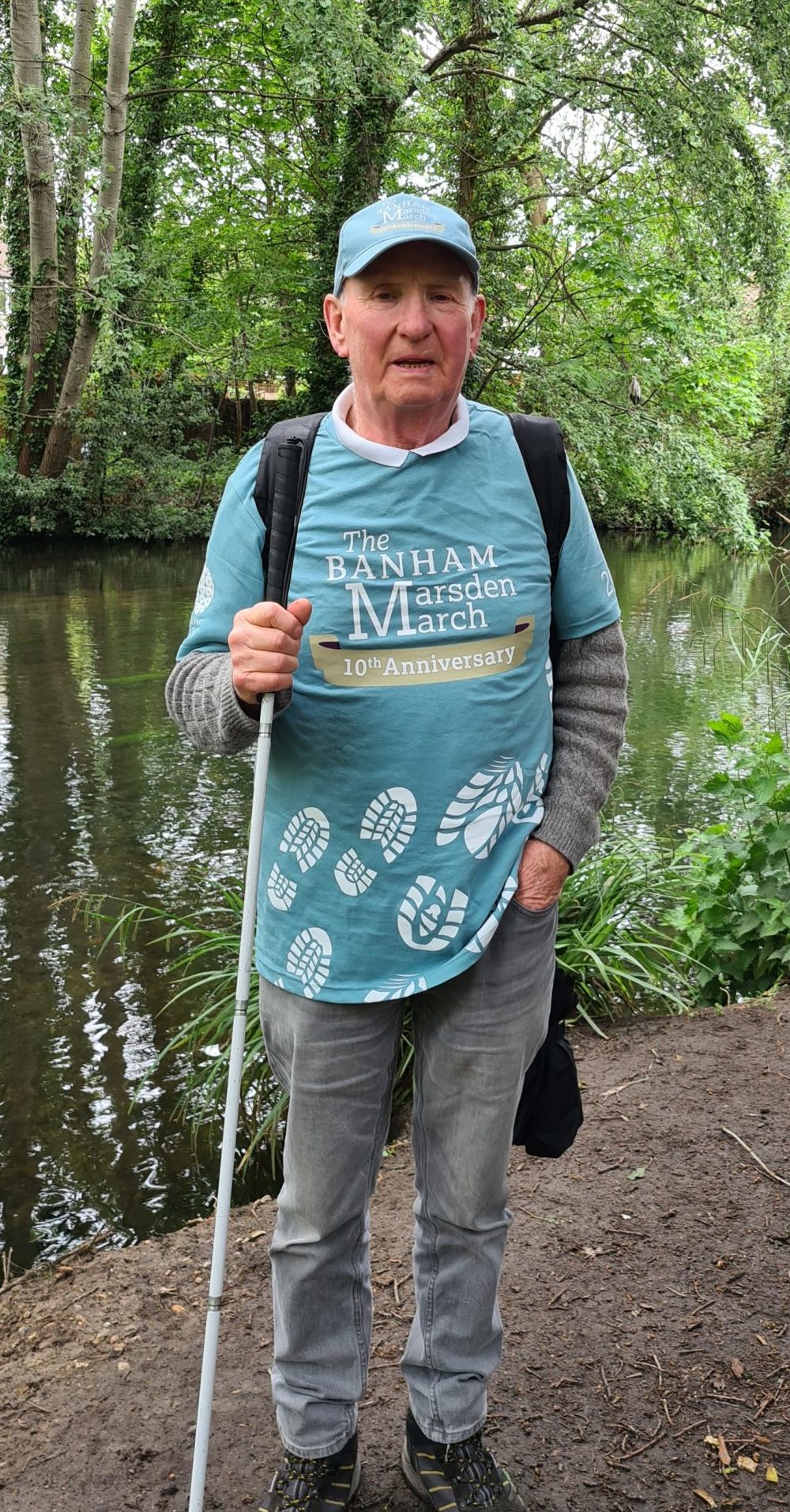 Coleman Flaherty in his walking gear in a forest setting