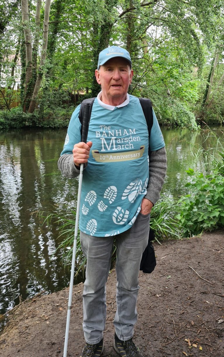 Coleman Flaherty in his walking gear in a forest setting