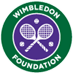 The green and purple logo for the Wimbledon Foundation, showing two crossed tennis racquets.