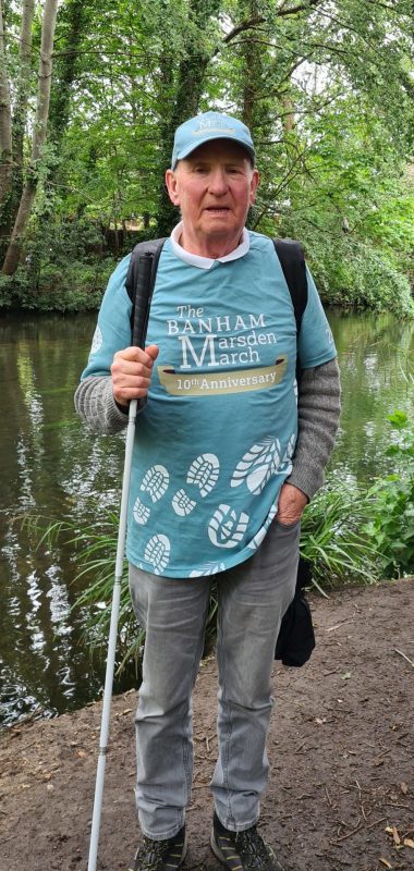 Coleman Flaherty in his walking gear in a forest setting